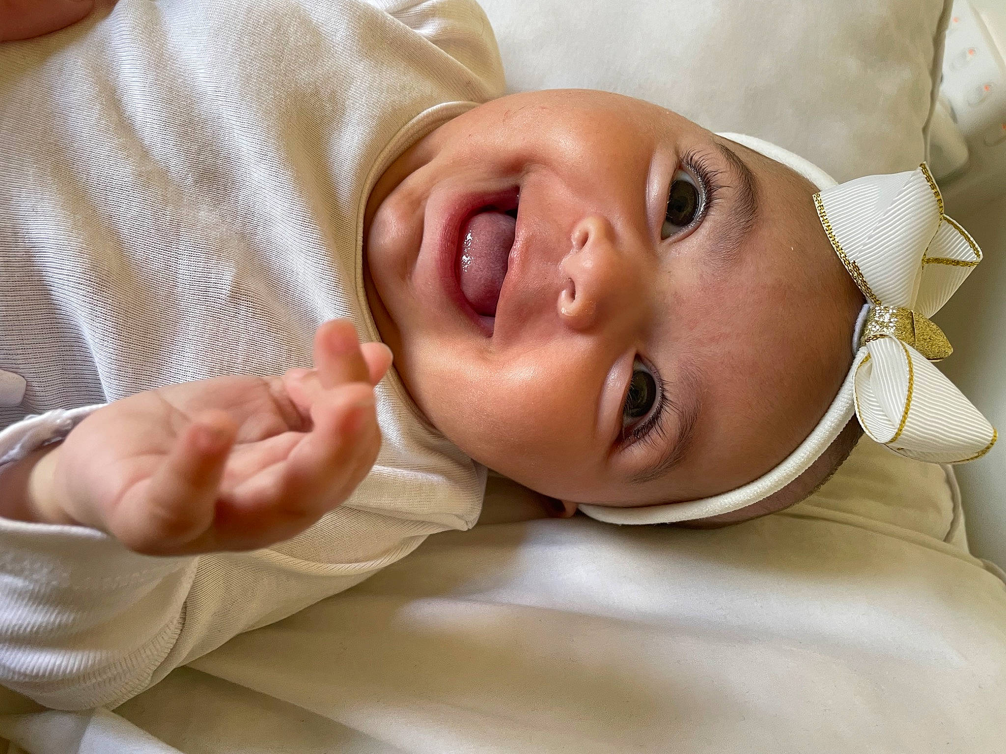 Amiah joined the competition — help win amazing prizes! baby, cheek, comfort, ear, eye, eyebrow, eyelash, finger, gesture, hand, happy, hat, head, headwear, human_body, iris, lip, mouth, neck, nose