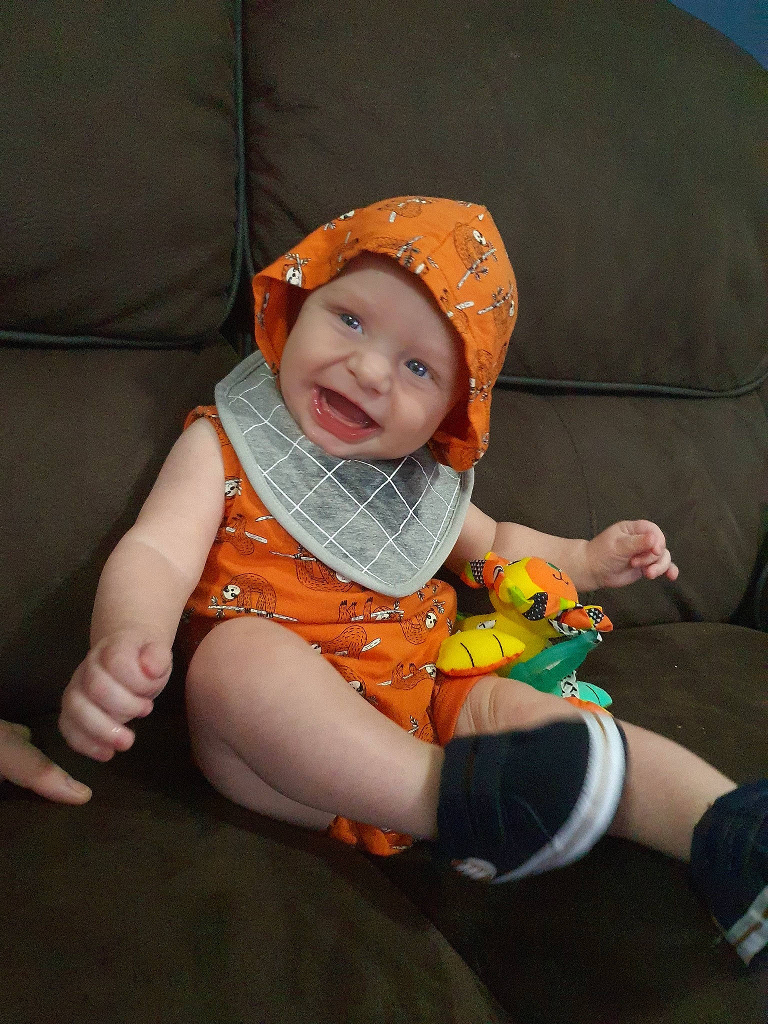 Caelan joined the competition — help win amazing prizes! baby, child, headwear, orange, person, sitting, toddler
