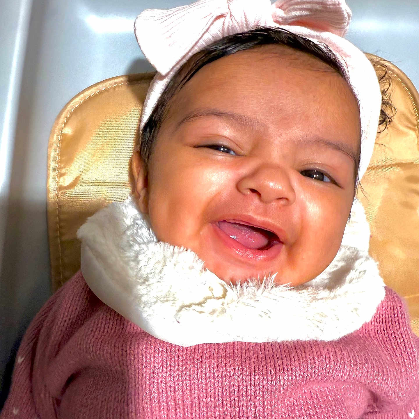 Carolina joined the competition — help win amazing prizes! apparel, baby, child, cozy, cushion, cute, face, fashion, happy, headband, indoors, infant, person, pink, portrait, seat, smiling, sweater, warm, young