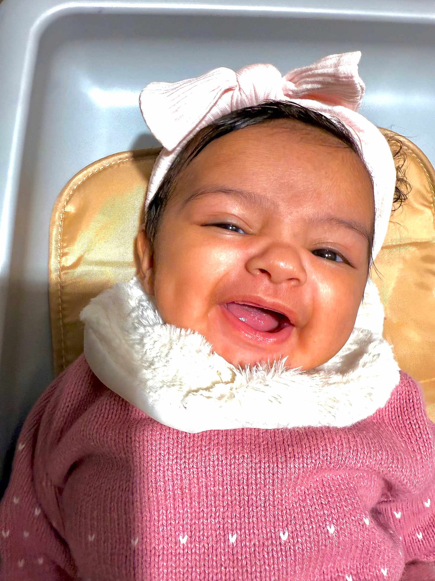 Carolina joined the competition — help win amazing prizes! baby, smiling, headband, pink, sweater, infant, happy, face, cushion, seat, child, cozy, cute, portrait, indoors, young, person, apparel, fashion, warm