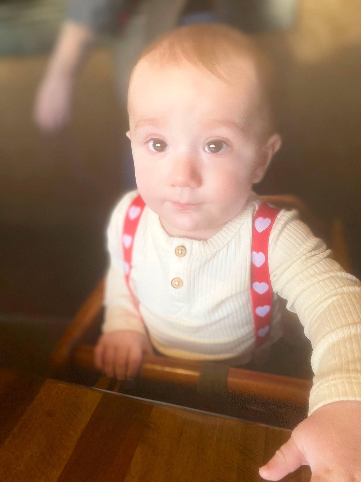 Marcus is registered to the contest to win money with this photo: baby, baby_toddler_clothing, cheek, eye, eyebrow, finger, hair, hand, happy, human_body, iris, lip, mouth, neck, nose, person, skin, sleeve, smile, table