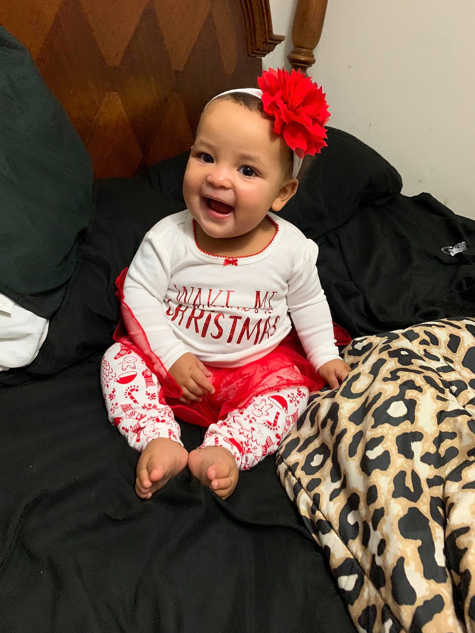 Zaniya is registered to the contest to win money with this photo: child, day, fun, girl, hair_accessory, headgear, infant, organ, person, product, red, skin, smile, textile, toddler