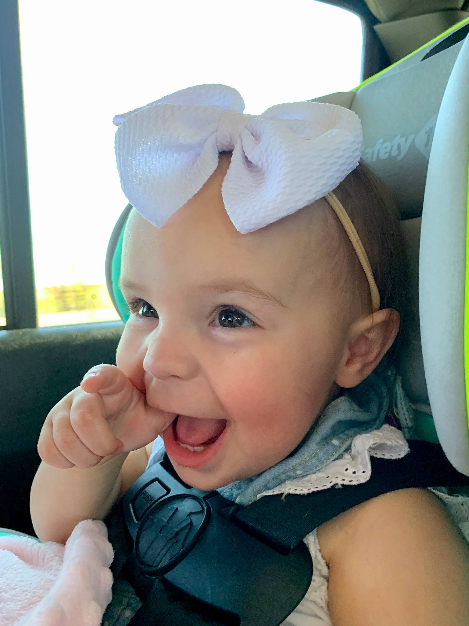 Hensley is registered to the contest to win money with this photo: baby, baby_toddler_clothing, cap, cheek, cool, eyelash, finger, fun, gesture, hand, happy, hat, lip, mouth, person, pink, skin, smile, thumb, toddler