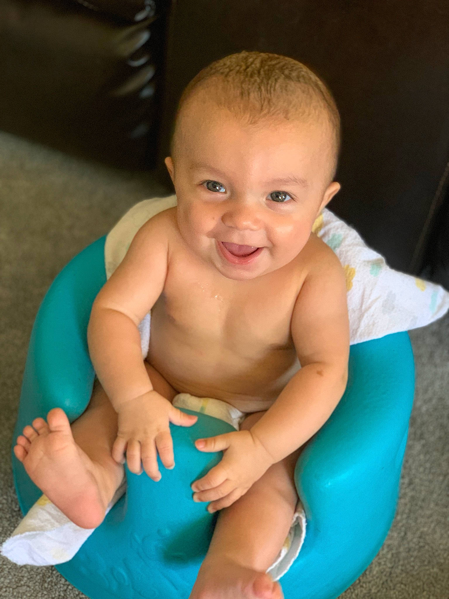 Jakobe joined the competition — help win amazing prizes! baby, baby_bathing, baby_products, baby_toddler_clothing, blue, cheek, child, eye, face, facial_expression, fun, head, joy, leg, muscle, person, product, sitting, skin, smile
