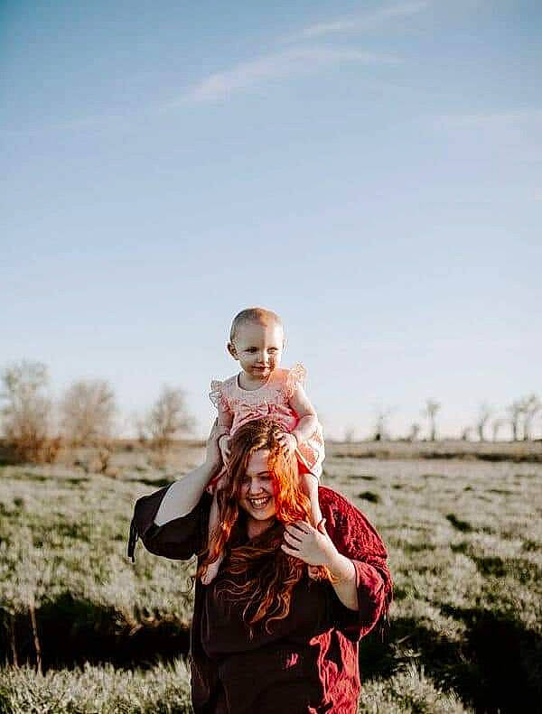 Roselynn is registered to the contest to win money with this photo: flash_photography, fun, grass, happy, human, joy, landscape, people_in_nature, person, photo_shoot, photograph, photography, portrait, portrait_photography, sitting, sky, smile, stock_photography, tree