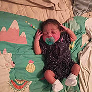 Aviana joined the competition — help win amazing prizes! newborn, baby, sleeping, pacifier, polka_dot, socks, quilt, blanket, llama, mountain, infant, child, cute, resting, indoors, soft, cozy, person, pattern, fabric