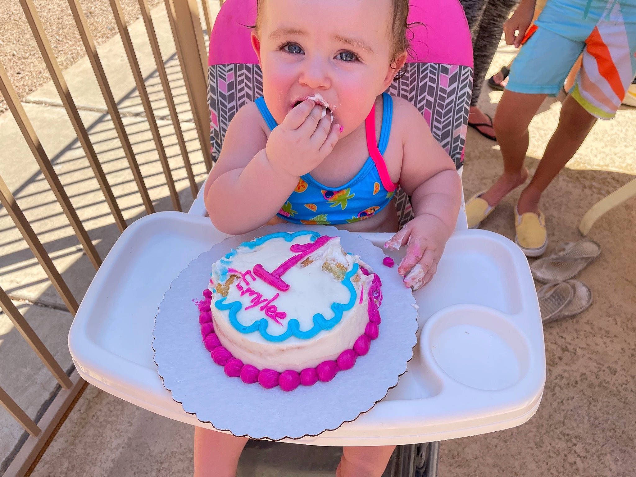 Emylee is registered to the contest to win money with this photo: baby, baby_toddler_clothing, baked_goods, birthday_cake, birthday_party, cake, cake_decorating, cake_decorating_supply, chair, child, food, fun, happy, leisure, person, photograph, pink, smile, sugar_cake, table