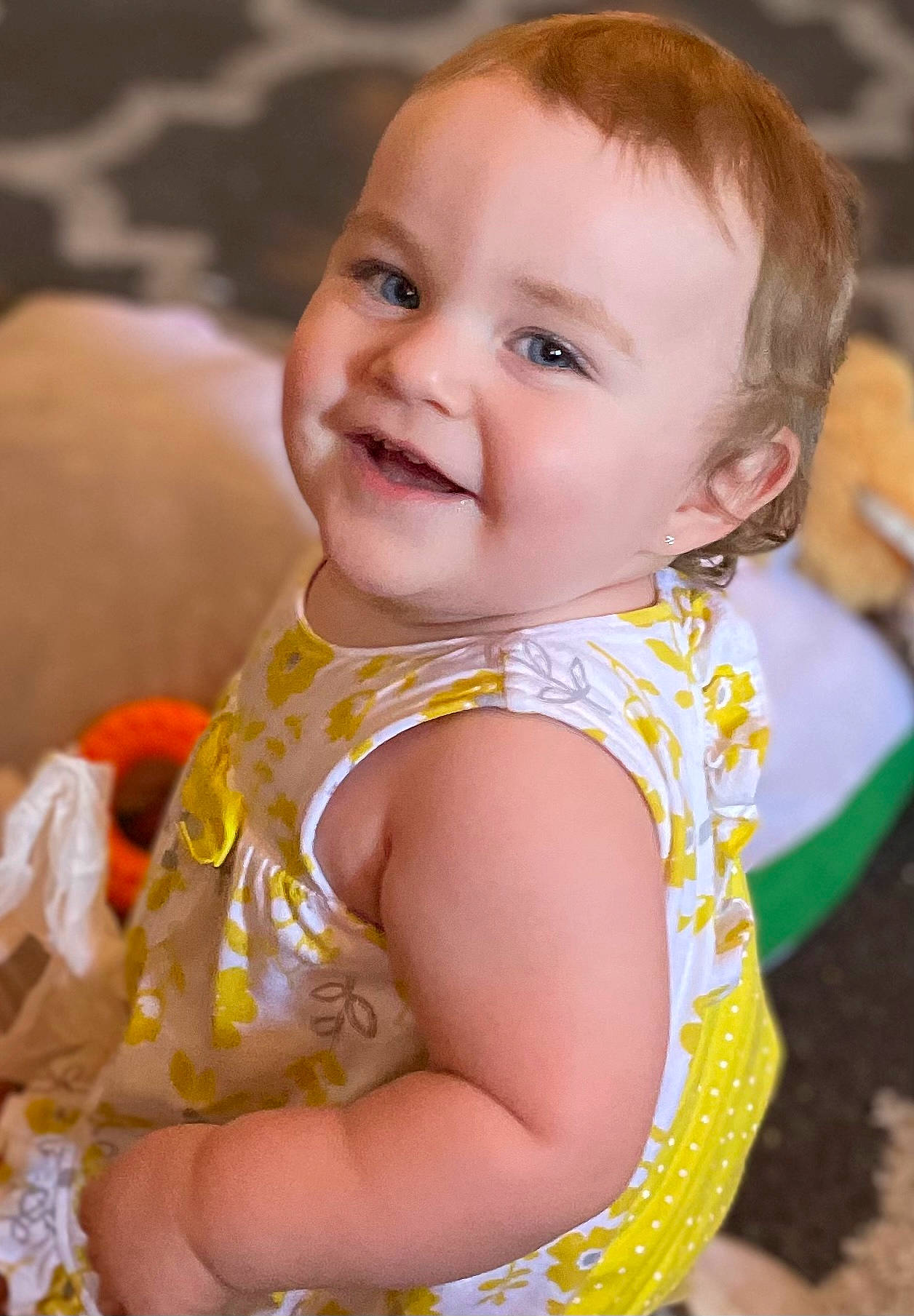 Emylee is registered to the contest to win money with this photo: arm, baby, baby_toddler_clothing, cheek, child, chin, dress, eye, face, facial_expression, flash_photography, happy, iris, joy, lip, nose, orange, people, person, skin