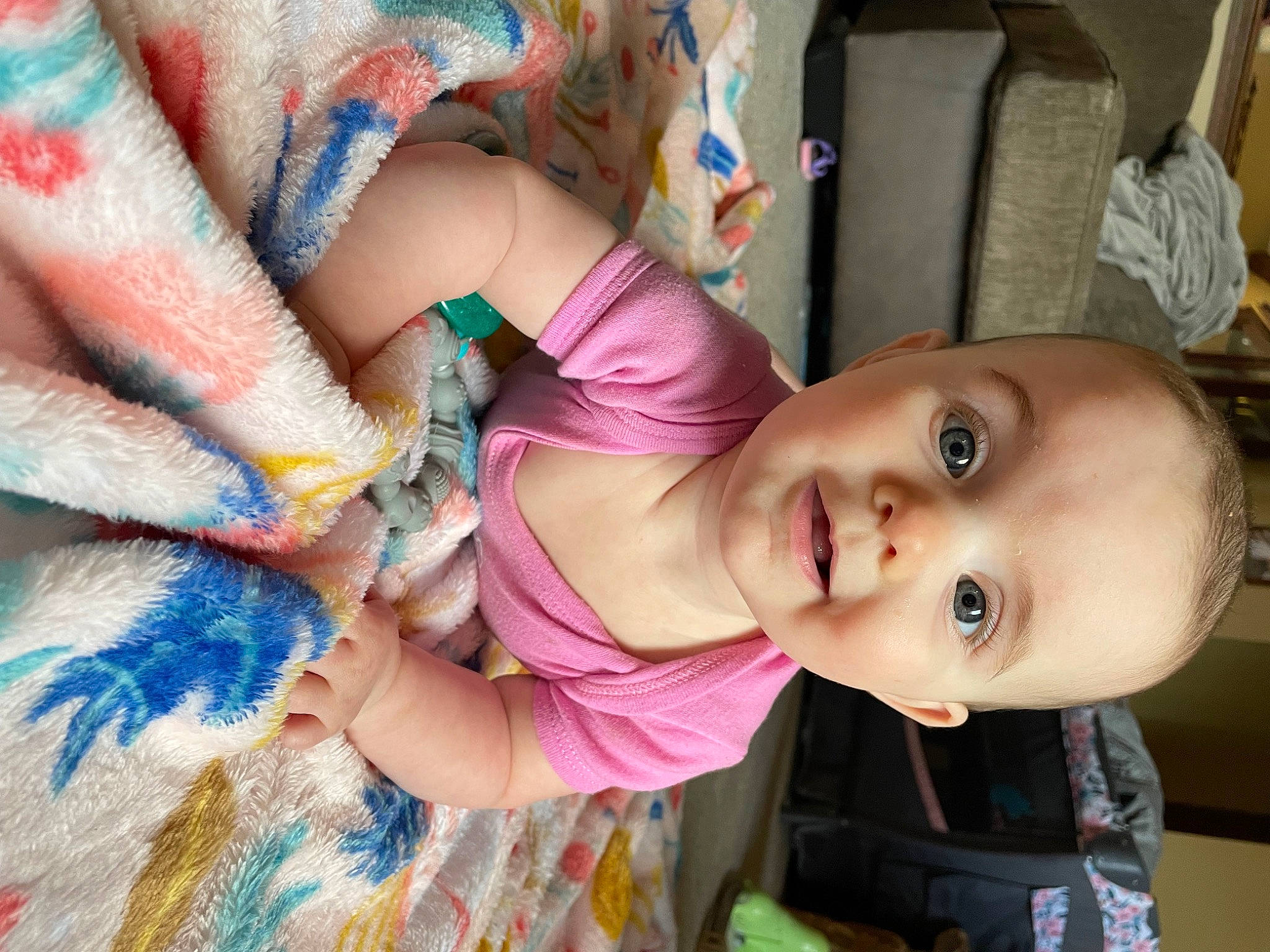 Parklie is registered to the contest to win money with this photo: baby, baby_products, baby_toddler_clothing, cheek, child, dress, eye, eyelash, happy, human_body, iris, mouth, neck, nose, person, plant, skin, smile, textile, toddler