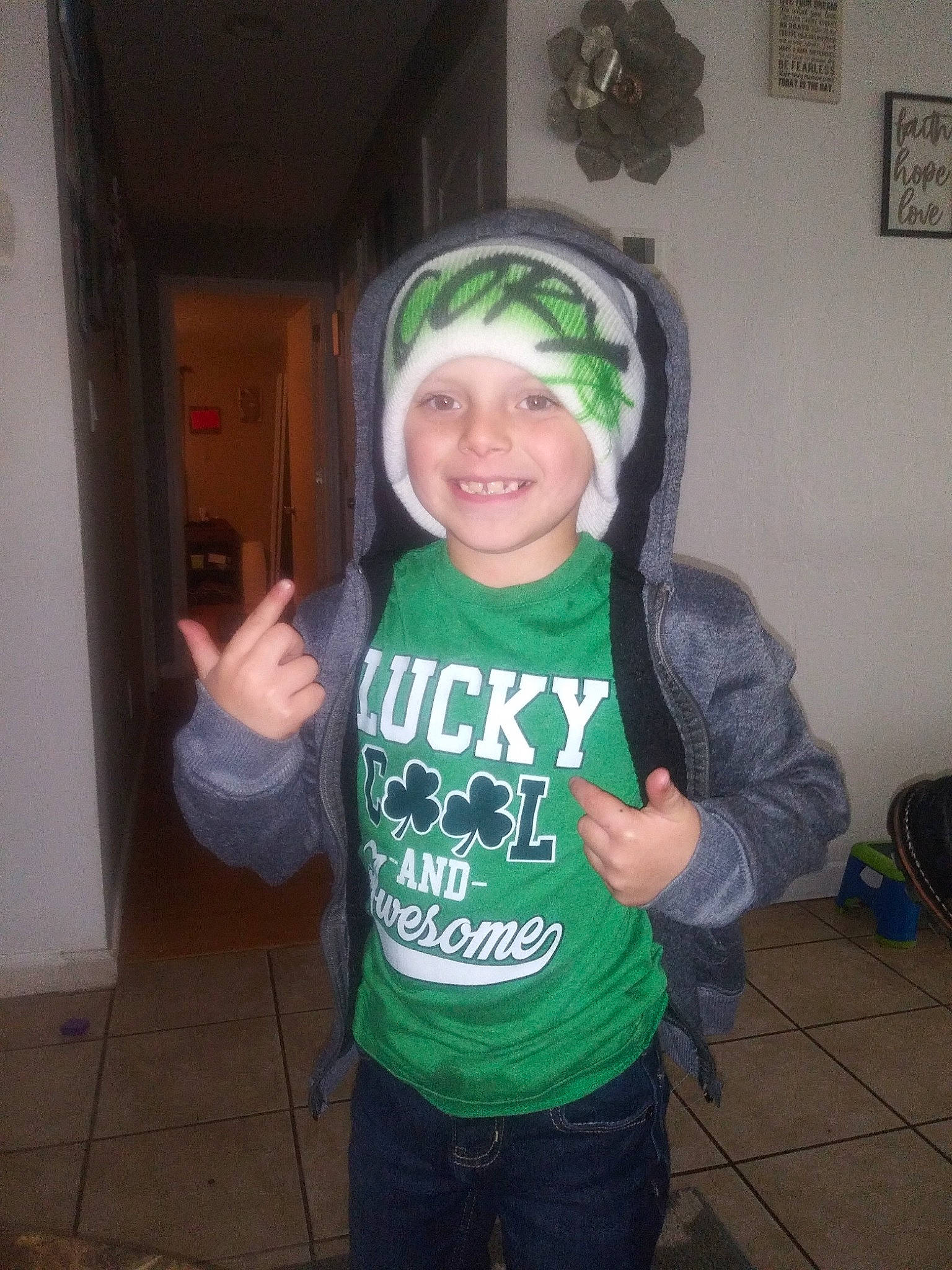 Kevin is registered to the contest to win money with this photo: backpack, bag, cap, costume, door, event, fun, happy, headgear, headwear, holiday, humour, jeans, joy, laugh, luggage_and_bags, person, personal_protective_equipment, picture_frame, sleeve