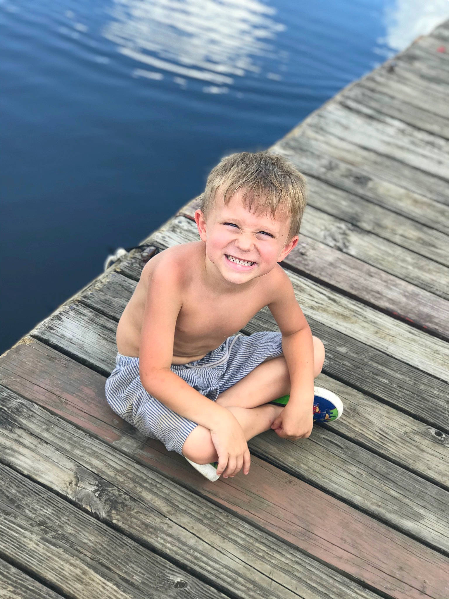 Karsen joined the competition — help win amazing prizes! barefoot, chin, daytime, dock, flash_photography, flooring, foot, fun, grass, happy, hardwood, joy, leg, leisure, person, skin, smile, summer, toddler, tree