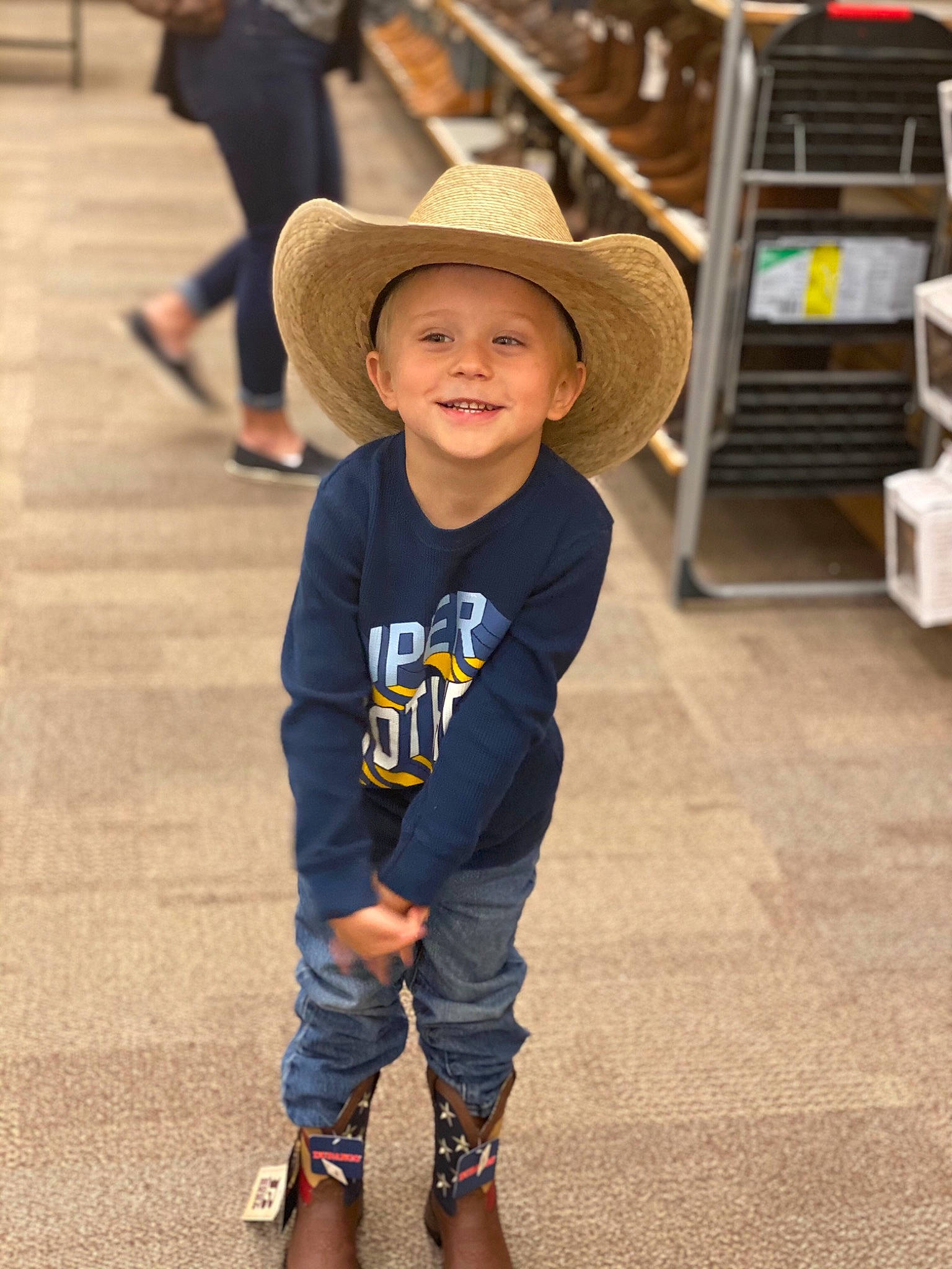 Karsen is registered to the contest to win money with this photo: cap, child, cool, cowboy_hat, eye, flooring, fun, happy, hat, headgear, headwear, joy, leg, leisure, person, shoe, sleeve, smile, street_fashion, sun_hat