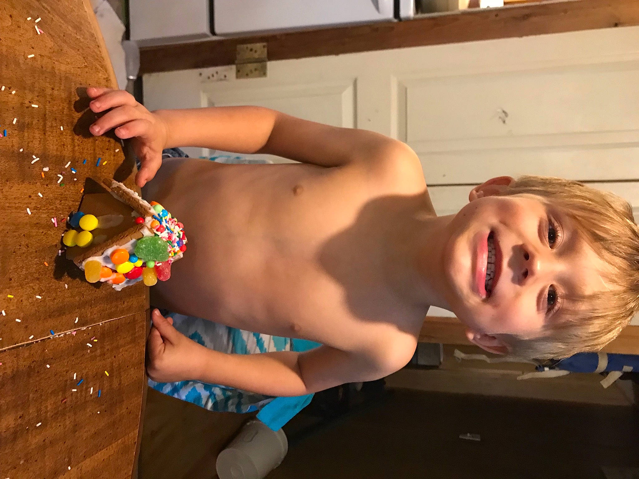 Karsen is registered to the contest to win money with this photo: abdomen, barechested, chest, elbow, finger, fun, glasses, hand, happy, human_leg, joy, navel, orange, person, smile, snapshot, stomach, sunglasses, swimwear, thigh