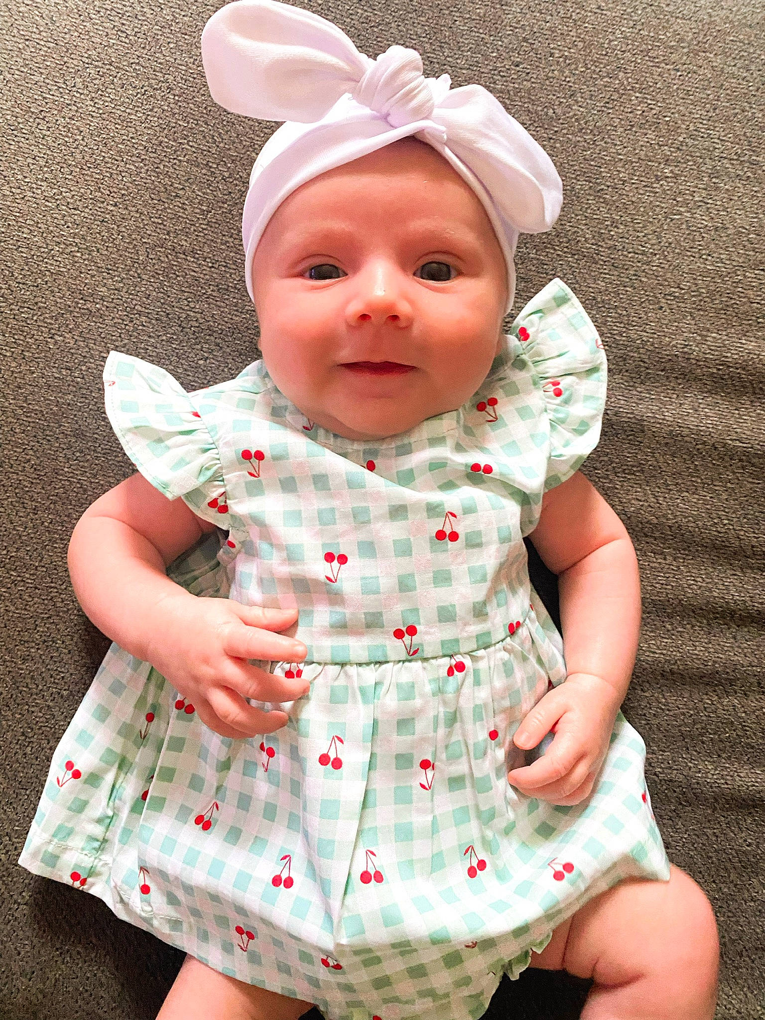 Myah joined the competition — help win amazing prizes! baby, baby_toddler_clothing, cheek, collar, dress, face, finger, gesture, head, headgear, headwear, human_body, lip, one_piece_garment, outerwear, person, pink, product, skin, sleeve