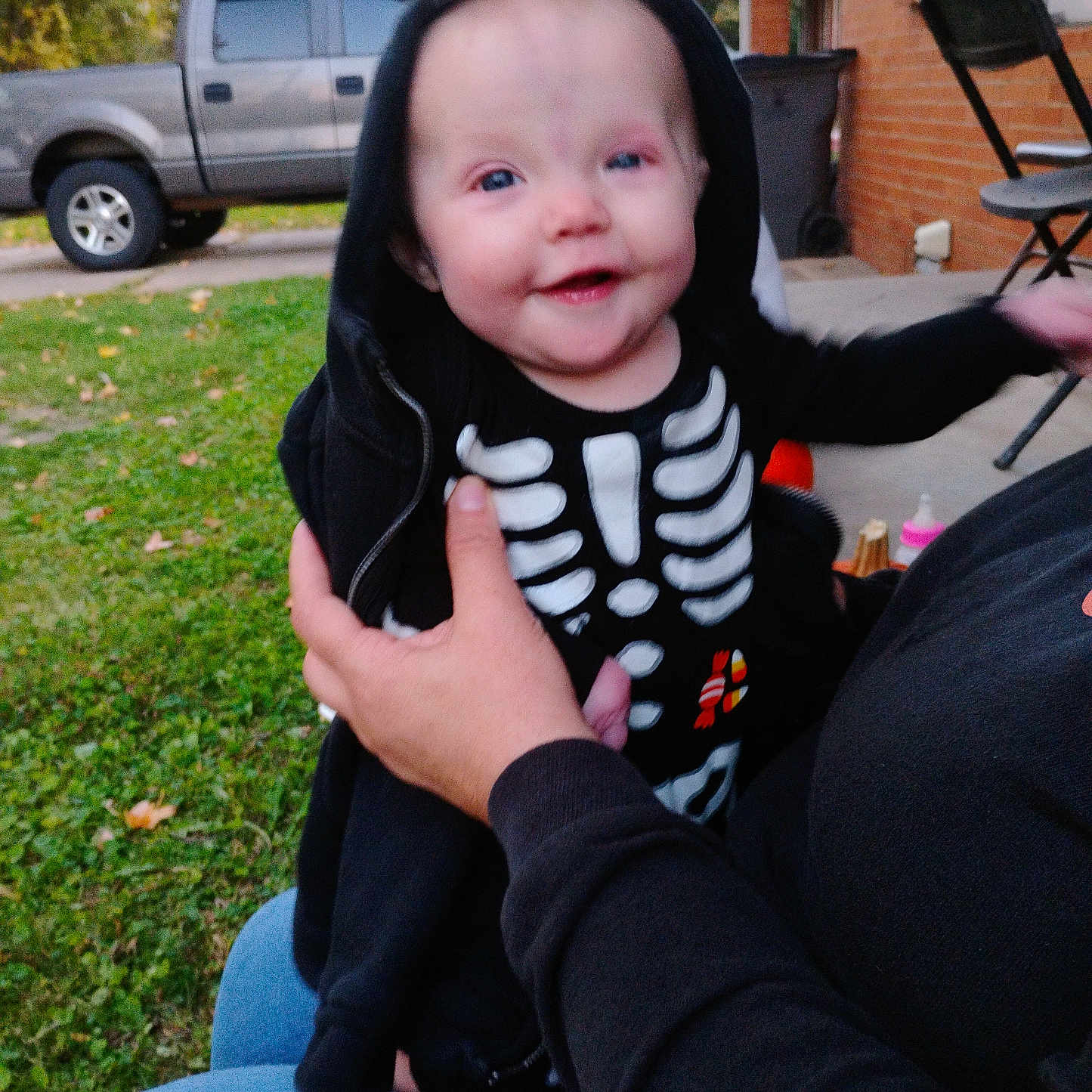 Kiersten is registered to the contest to win money with this photo: alloywheel, baby, car, carwheel, clothing, face, grass, head, machine, pants, person, photography, pickuptruck, plant, portrait, spoke, tire, transportation, vehicle, wheel