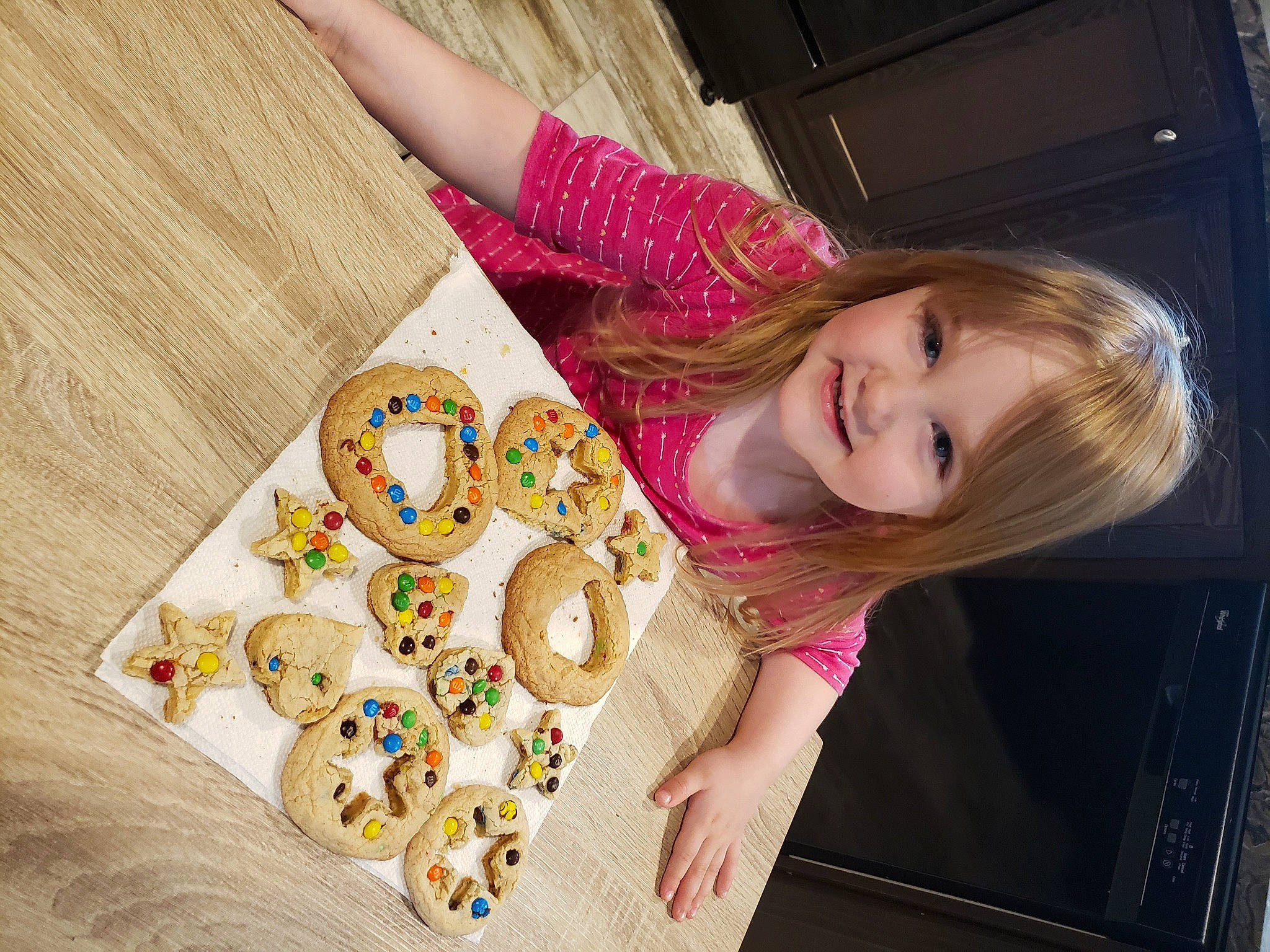 Kaleighanne is registered to the contest to win money with this photo: art, baby_toddler_clothing, button, child, circle, flooring, fun, happy, joy, linens, magenta, nail, pattern, person, play, sleeve, smile, t_shirt, toddler, visual_arts