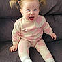 Adalena is registered to the contest to win money with this photo: toddler, child, happy, smiling, pigtails, blonde_hair, pink_heart_pattern, outfit, sitting, couch, indoor, white_socks, cute, baby, portrait, young_child, clothing, cozy, cheerful, face