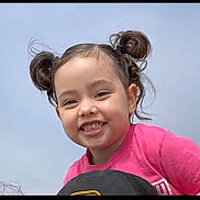 Juliette joined the competition — help win amazing prizes! child, girl, smiling, happy, face, hair_buns, pink_shirt, outdoor, sky, portrait, cute, young, childhood, joy, innocence, person, head, casual_clothing, daylight, cheerful