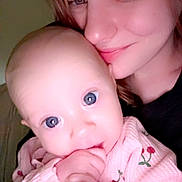 Hazelee is registered to the contest to win money with this photo: baby, woman, child, face, smile, cuddle, closeup, portrait, skin, hand, eyes, pink_clothing, love, affection, family, indoor, person, baby_clothes, happy, tender