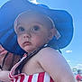 Beckham joined the competition — help win amazing prizes! baby, child, hat, blue_sky, outdoor, sunny, cloud, red_stripes, striped_clothing, person, face, wide_eyes, summer, daylight, holding, cute, infant, portrait, casual, serious_expression