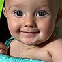 Beckham is registered to the contest to win money with this photo: baby, closeup, face, smile, eyes, infant, skin, blanket, child, cute, portrait, expression, adorable, young, person, indoors, happy, chubby_cheeks, baby_clothing, head