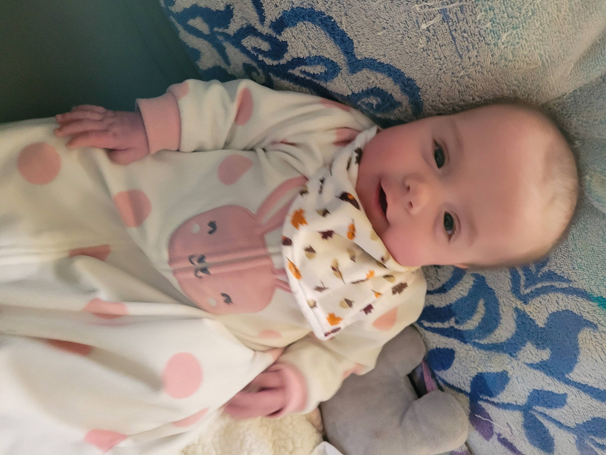 Arlyn is registered to the contest to win money with this photo: baby, baby_toddler_clothing, cheek, child, chin, collar, comfort, eye, facial_expression, finger, head, human_body, linens, lip, nose, pattern, person, skin, sleeve, textile