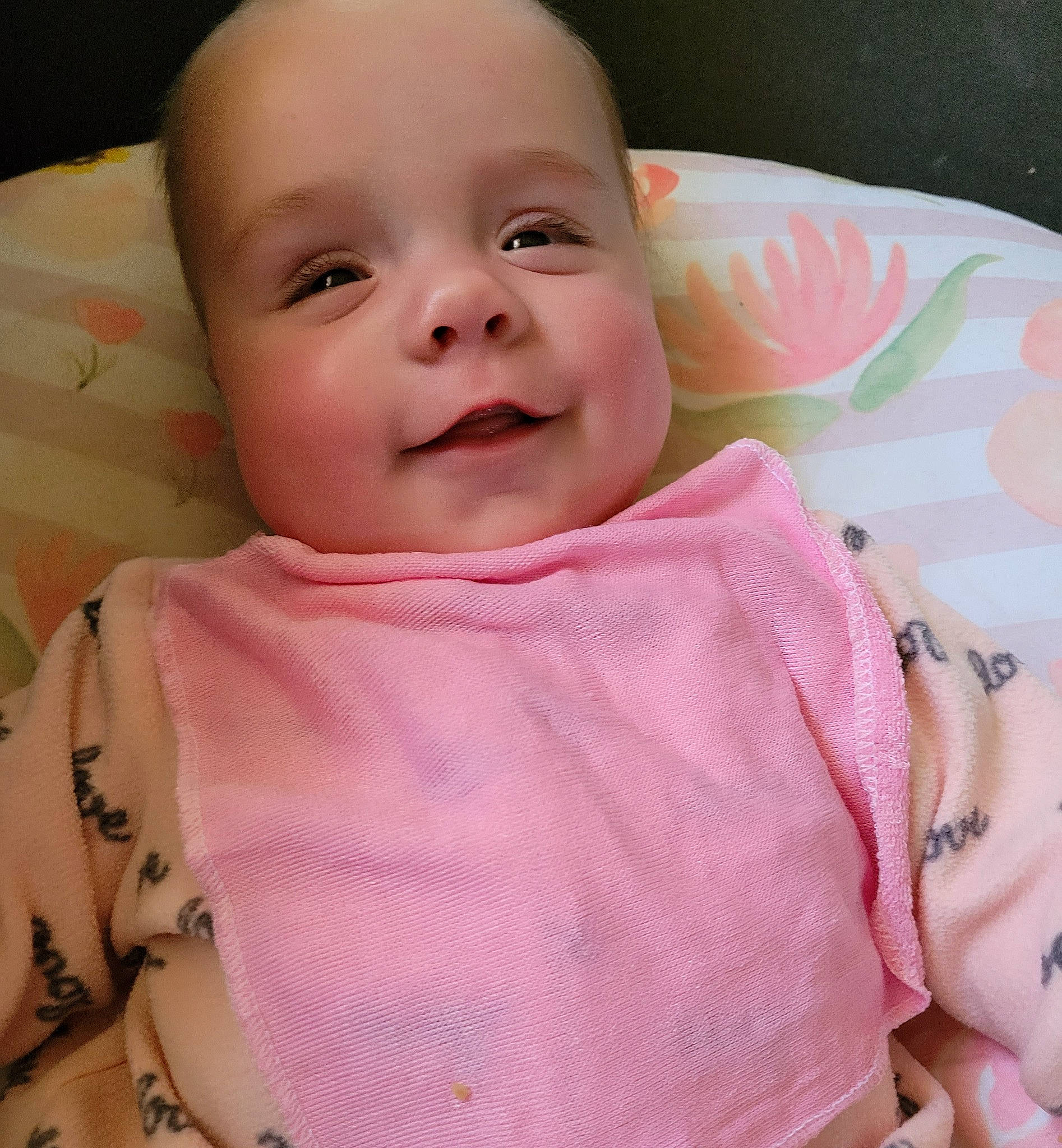 Arlyn is registered to the contest to win money with this photo: baby, baby_products, baby_toddler_clothing, cheek, clothing, comfort, eyebrow, eyelash, happy, human_body, iris, lip, mouth, neck, nose, person, pink, skin, sleeve, smile
