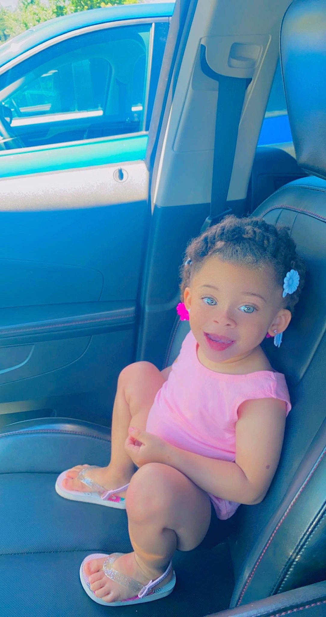 Tehyanni Hartso joined the competition — help win amazing prizes! aqua, auto_part, automotive_design, automotive_exterior, azure, baby_toddler_clothing, blue, bumper, child, electric_blue, fun, happy, human_leg, leisure, person, recreation, sitting, thigh, toddler, vehicle_door