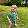 Leon is registered to the contest to win money with this photo: toddler, child, grass, outdoor, green_romper, barefoot, flower, smiling, cute, baby, nature, yard, happy, person, portrait, standing, summer, daylight, skin, head