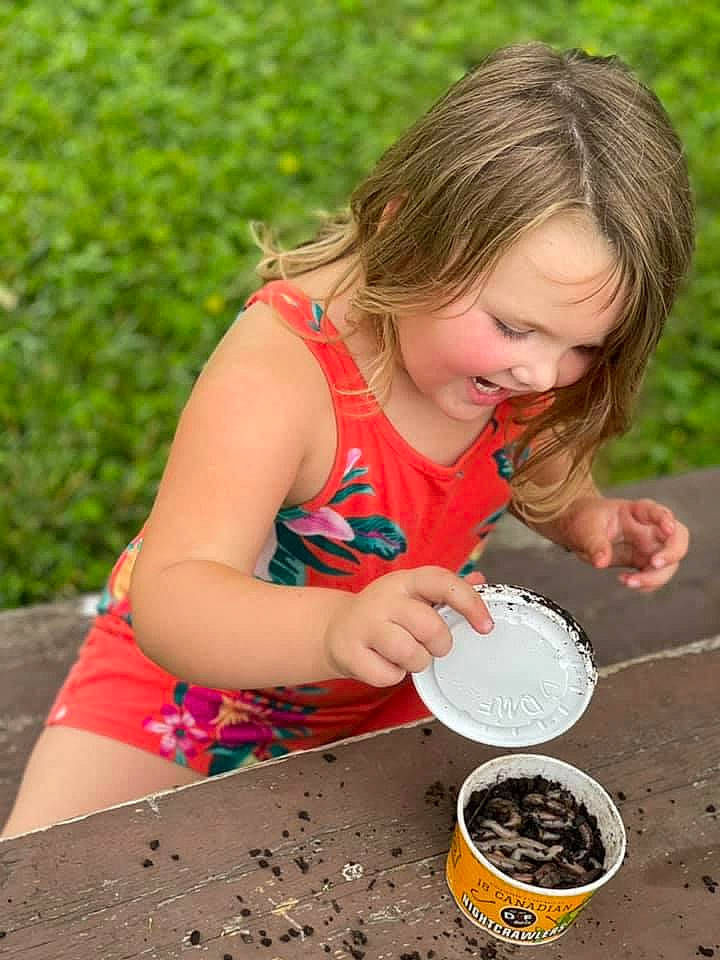 Alison joined the competition — help win amazing prizes! bucket, child, comfort_food, cooking, dish, fun, grass, hair, happy, leisure, people_in_nature, person, play, recreation, sitting, smile, soil, summer, t_shirt, toddler