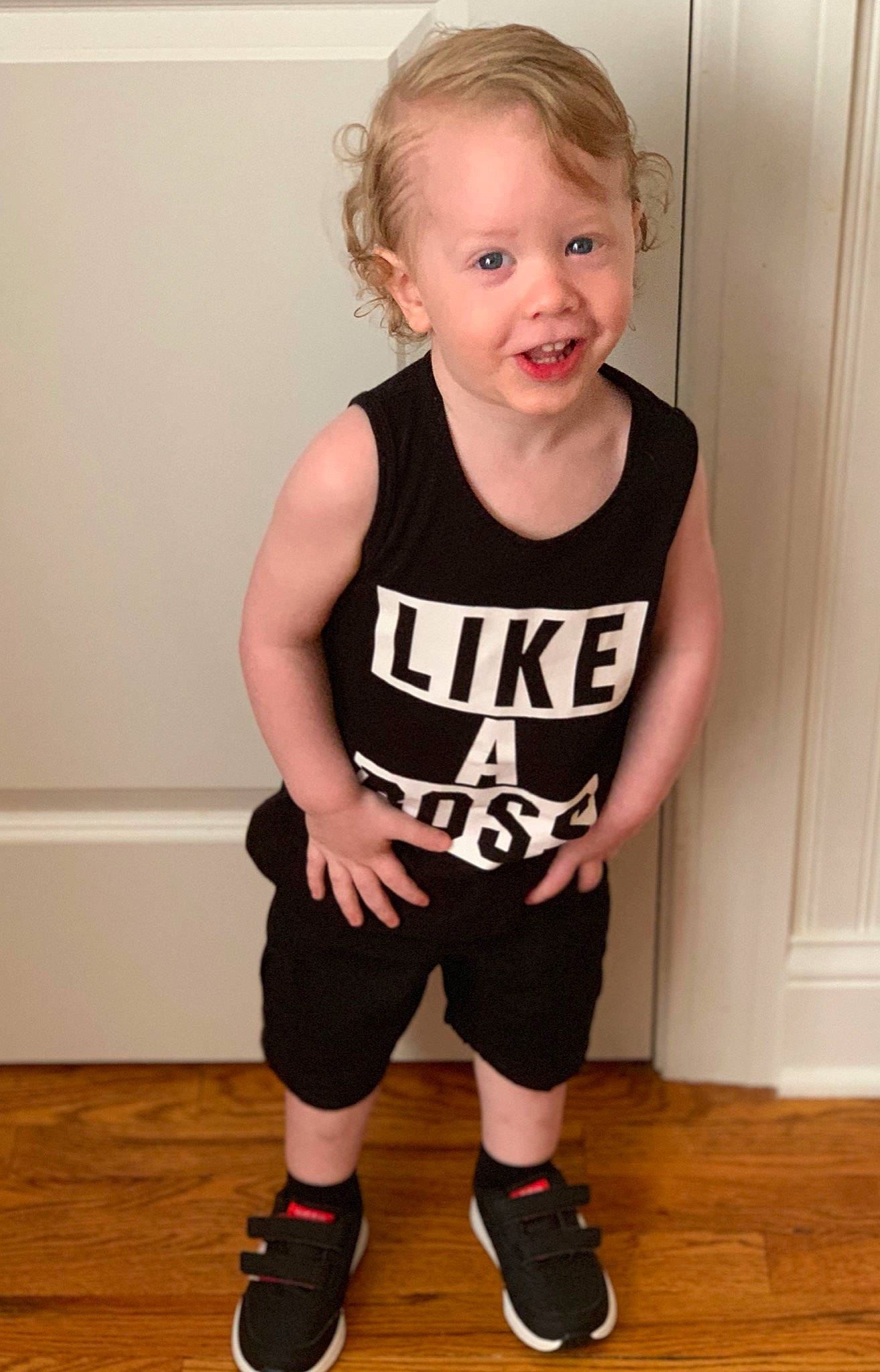 Elijah joined the competition — help win amazing prizes! arm, baby_toddler_clothing, black, child, clothing, footwear, joint, joy, knee, leg, outerwear, person, product, shoe, shorts, shoulder, sleeve, sportswear, standing, t_shirt