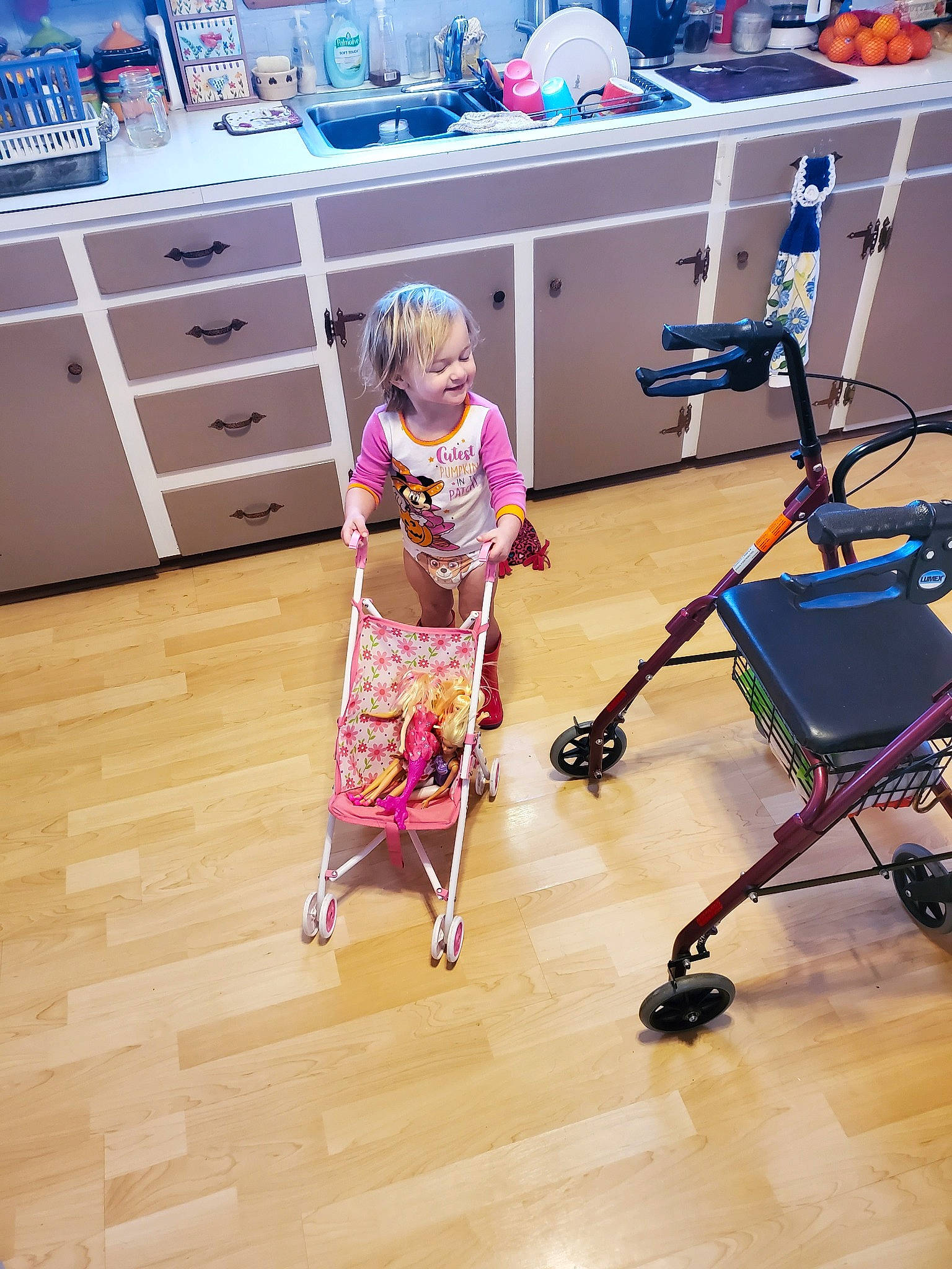 Cierra joined the competition — help win amazing prizes! baby_carriage, baby_products, child, floor, flooring, hardwood, leg, leisure, person, play, product, room, service, shopping, supermarket, toddler, vehicle