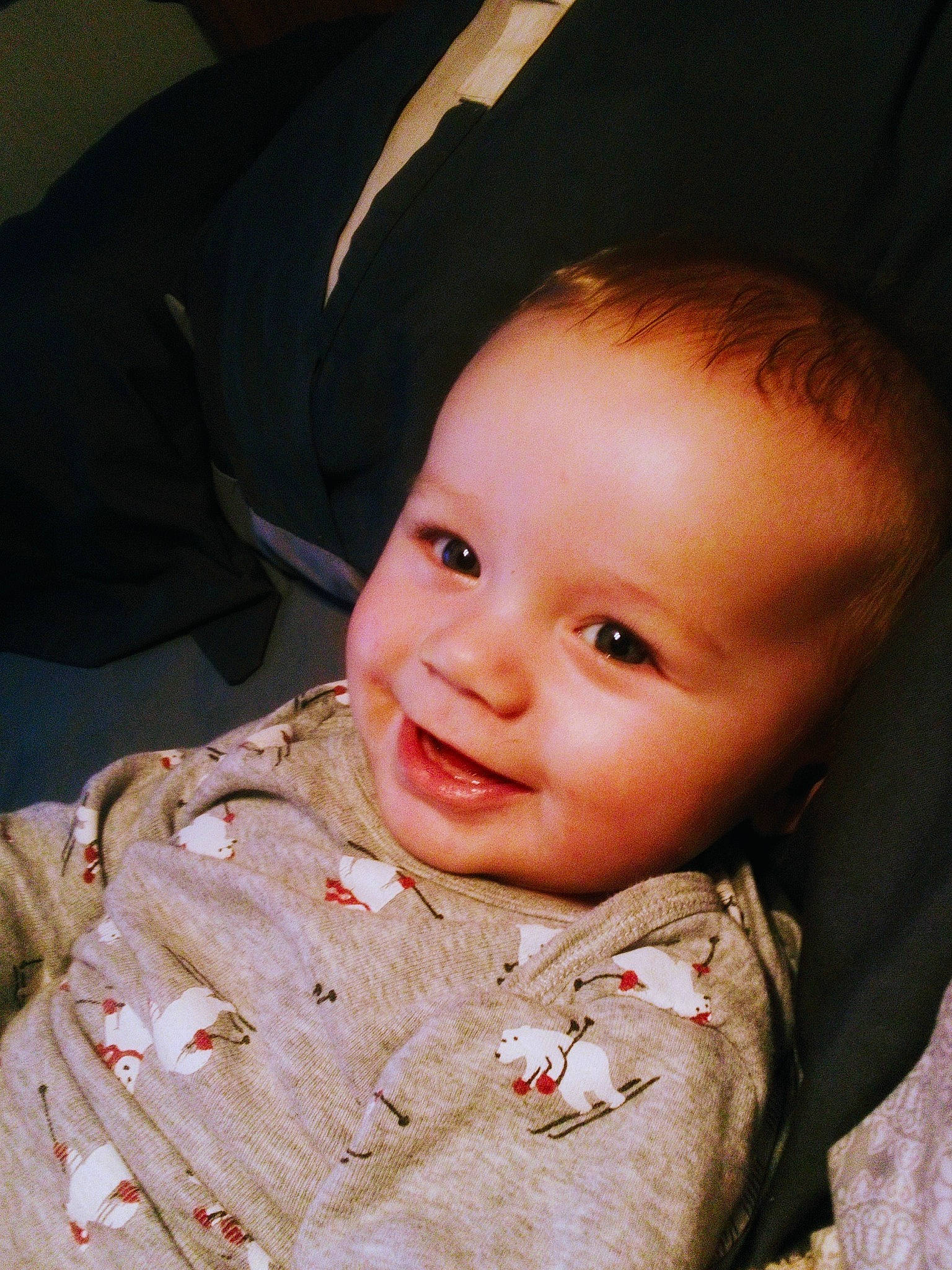 Noah is registered to the contest to win money with this photo: baby, cheek, chin, ear, eye, eyebrow, finger, flash_photography, forehead, gesture, happy, iris, joy, lip, mouth, nose, person, skin, sleeve, smile