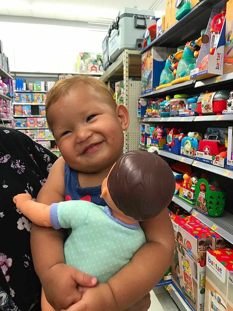 Catalella Ortiz joined the competition — help win amazing prizes! baby, ball, face, food, football, happy, head, indoors, person, photography, portrait, shelf, shop, shopping, smile, soccer, soccerball, sport, sweets, toy