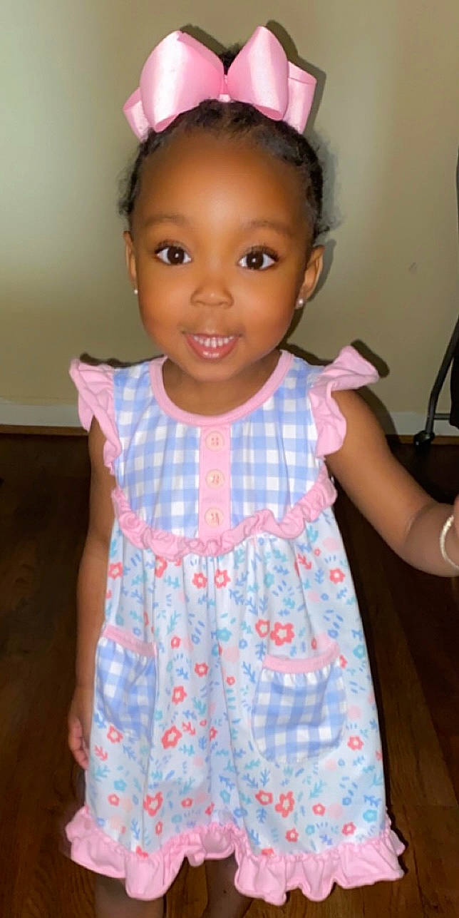 Karleigh joined the competition — help win amazing prizes! baby_toddler_clothing, beauty, cheek, child, day_dress, dress, fashion, fashion_design, hairstyle, happy, joy, magenta, one_piece_garment, pattern, person, pink, skin, sleeve, smile, standing