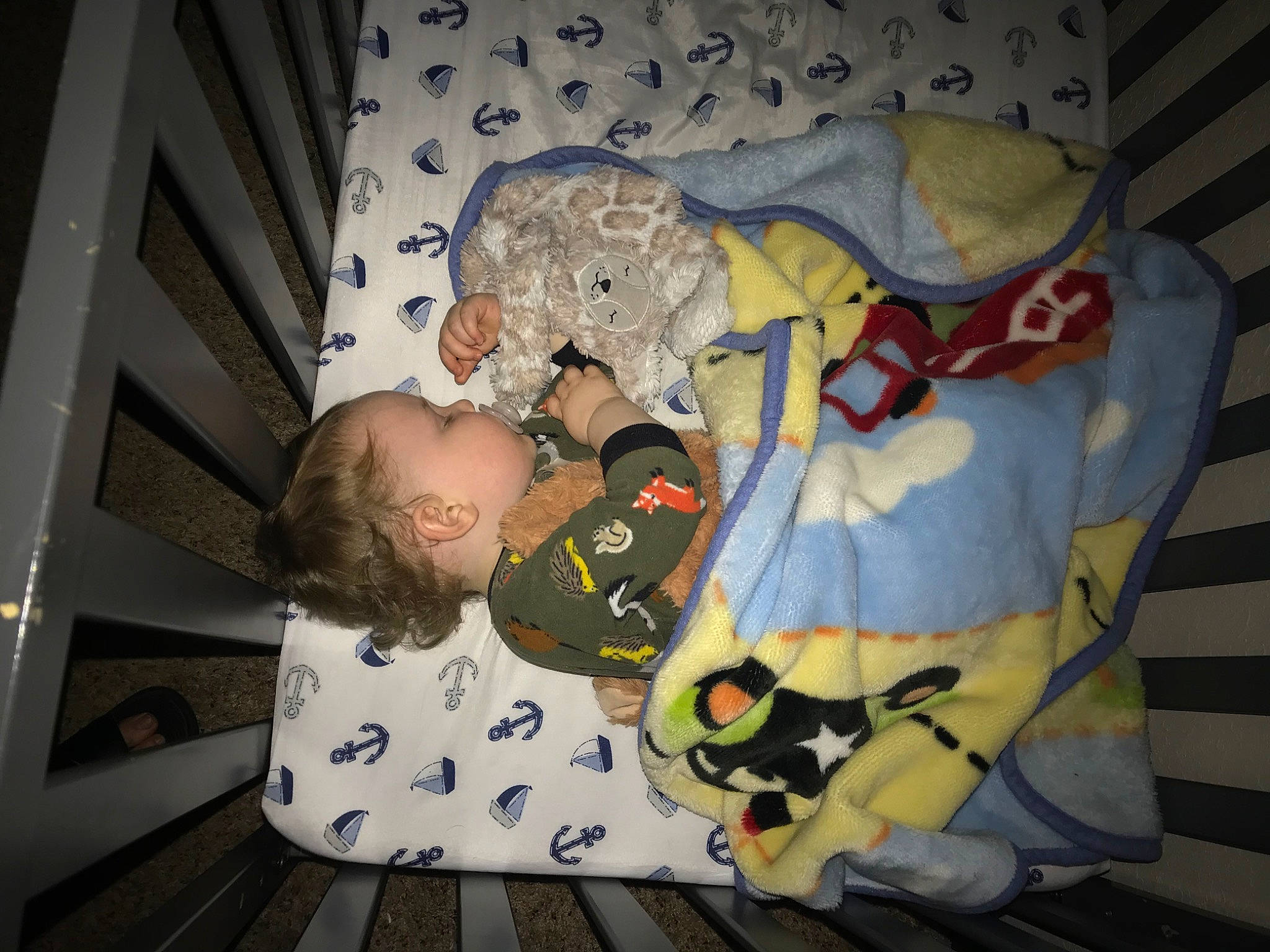 Derek is registered to the contest to win money with this photo: baby, baby_products, baby_toddler_clothing, bedtime, child, comfort, fun, linens, nap, pattern, person, room, sitting, sleep, toddler
