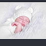 River is registered to the contest to win money with this photo: newborn, baby, sleeping, knitted_hat, white, soft_texture, fluffy_blanket, cozy, cute, infant, portrait, peaceful, resting, child, warm, closeup, headwear, tiny_hand, cuteness, serene