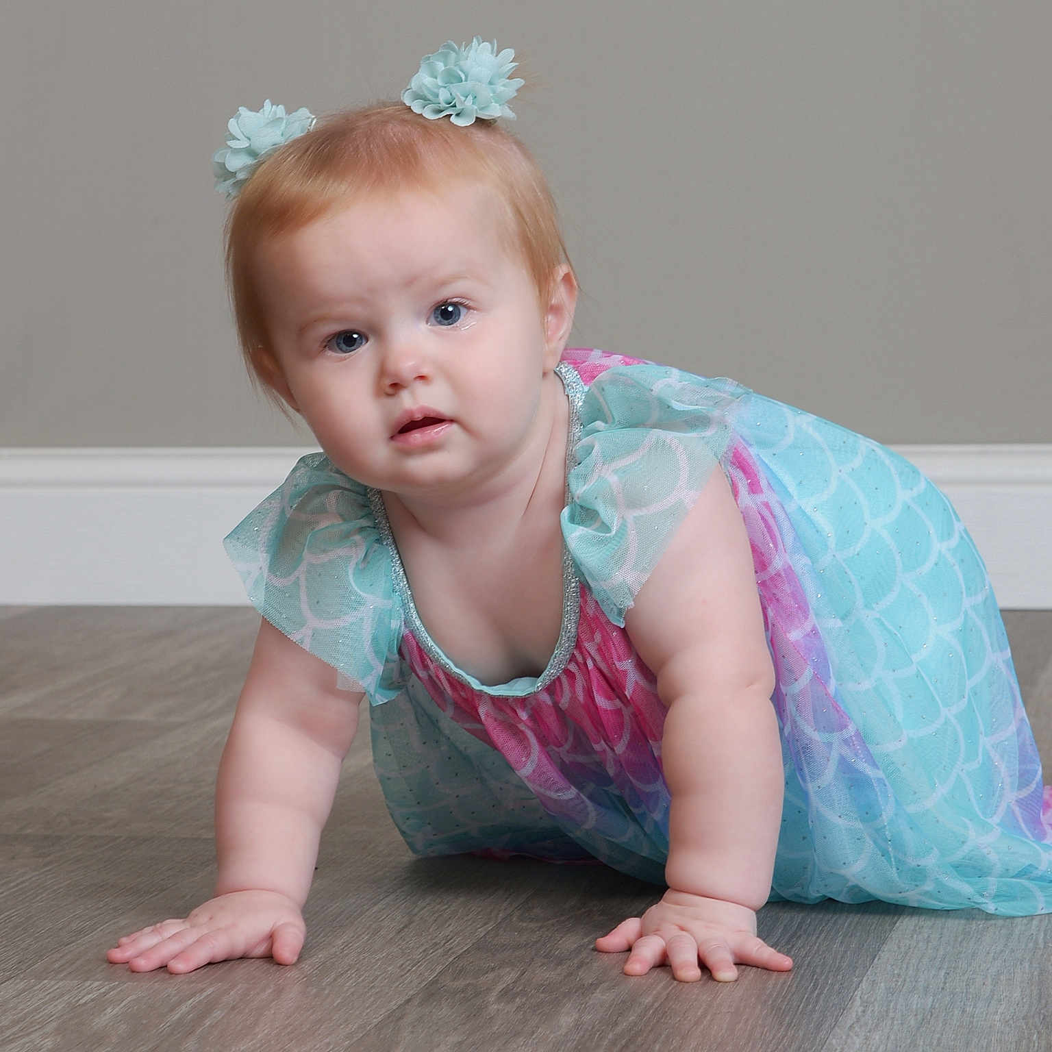 Emily joined the competition — help win amazing prizes! baby, babycrawling, bodypart, clothing, crawling, dress, face, finger, hand, hardwood, head, person, photography, portrait, wood