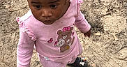 Ariya joined the competition — help win amazing prizes! toddler, child, baby, outdoors, standing, portrait, face, braids, beads, pink_clothing, striped_pants, shoes, teddy_bear, cartoon, curious, looking_up, dirt, ground, natural_light, full_body