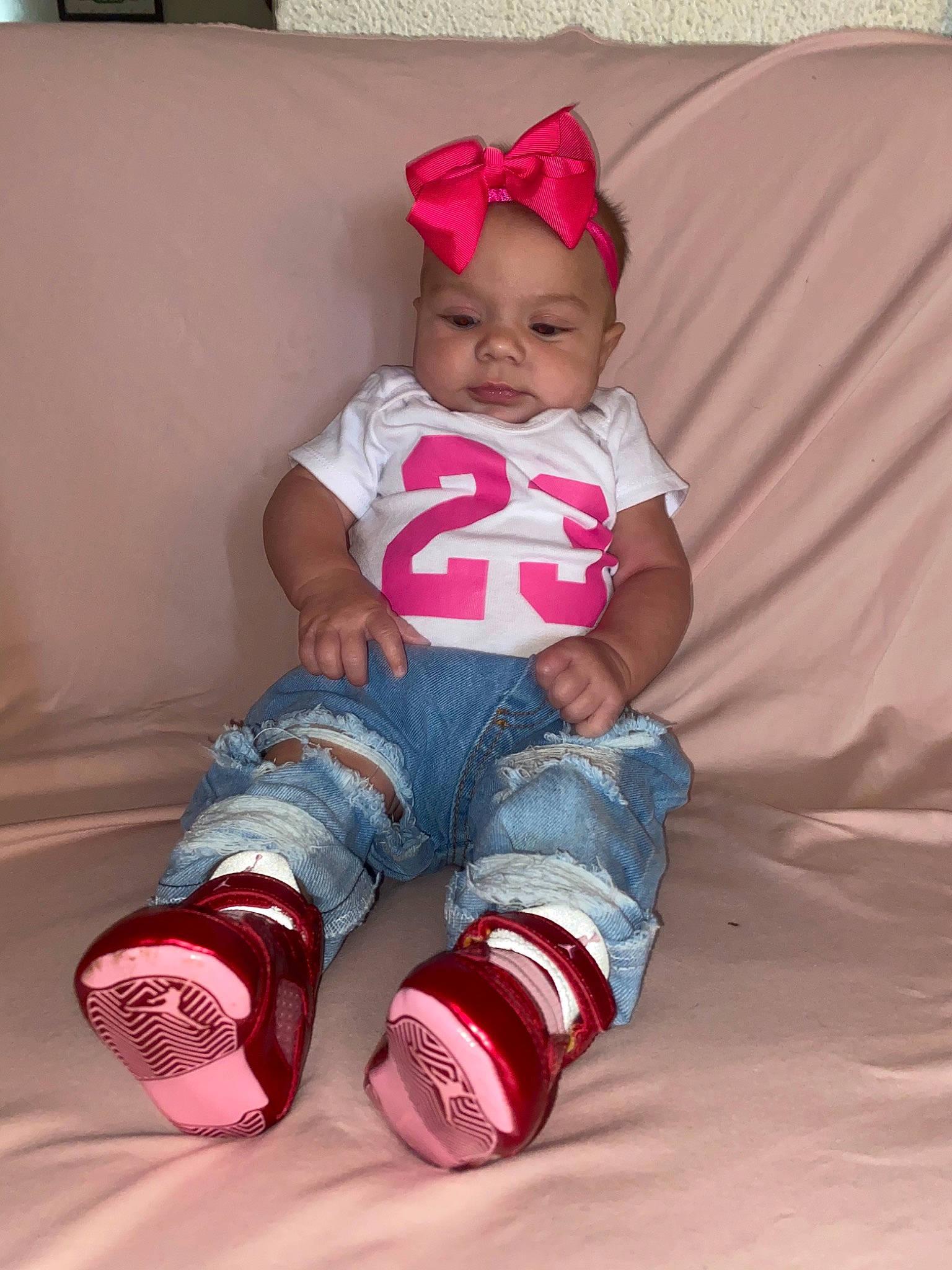 Evalynn joined the competition — help win amazing prizes! baby, baby_products, baby_toddler_clothing, child, footwear, headgear, headwear, leg, magenta, person, pink, play, product, shoe, skin, toddler