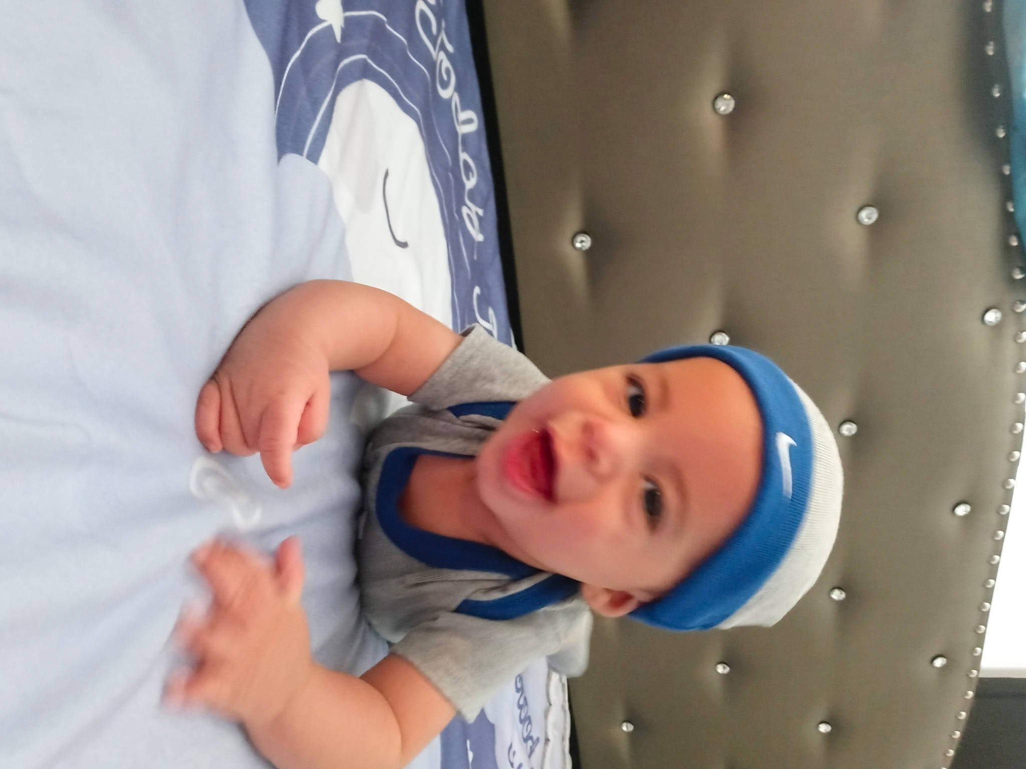 Aydan is registered to the contest to win money with this photo: baby, baby_products, baby_toddler_clothing, child, ear, finger, gesture, headwear, person, sleeve, thumb, toddler