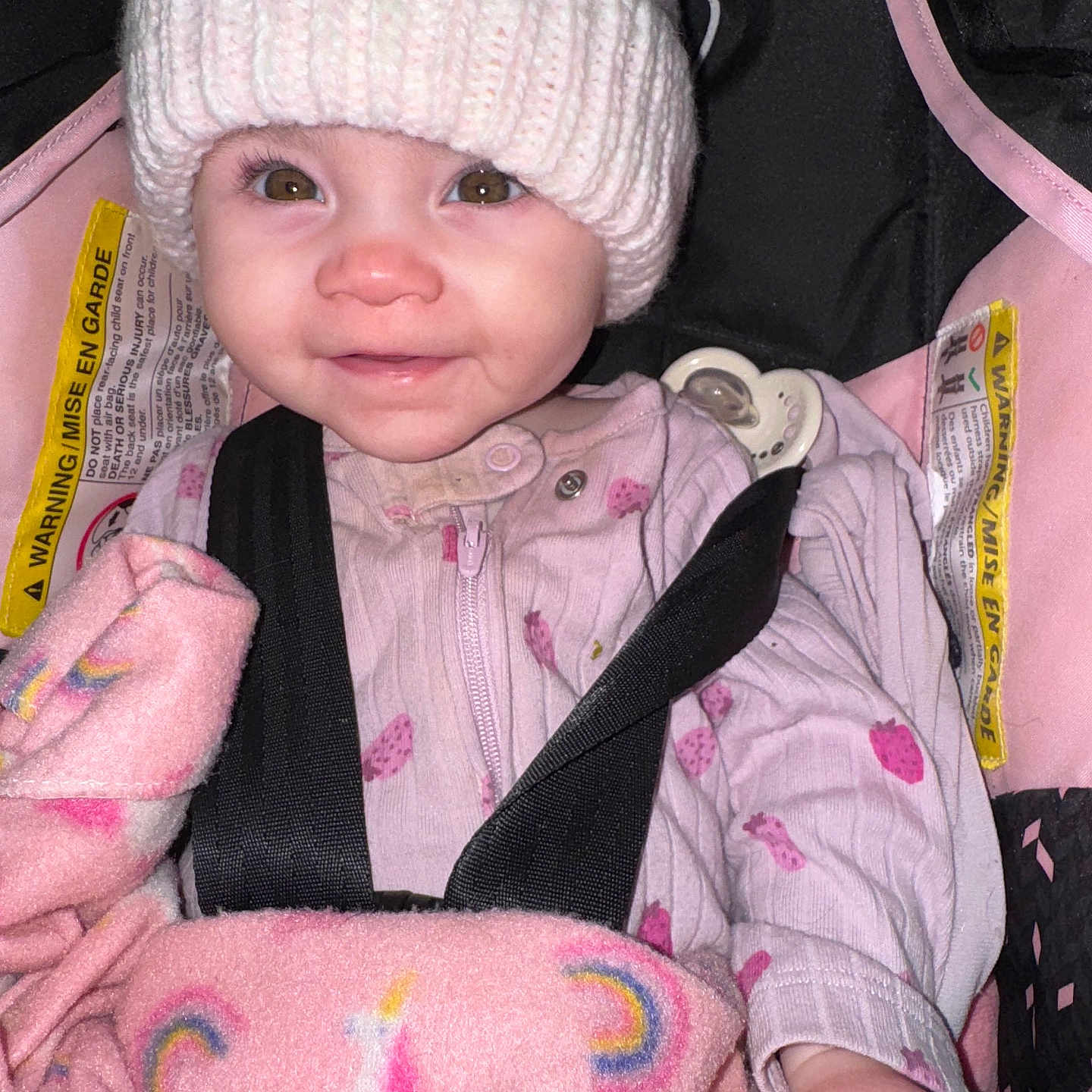 Juniper-Layne is registered to the contest to win money with this photo: accessories, baby, beanie, belt, bonnet, cap, car, car_interior, carseat, clothing, coat, face, glove, hat, head, jacket, person, photography, portrait, transportation