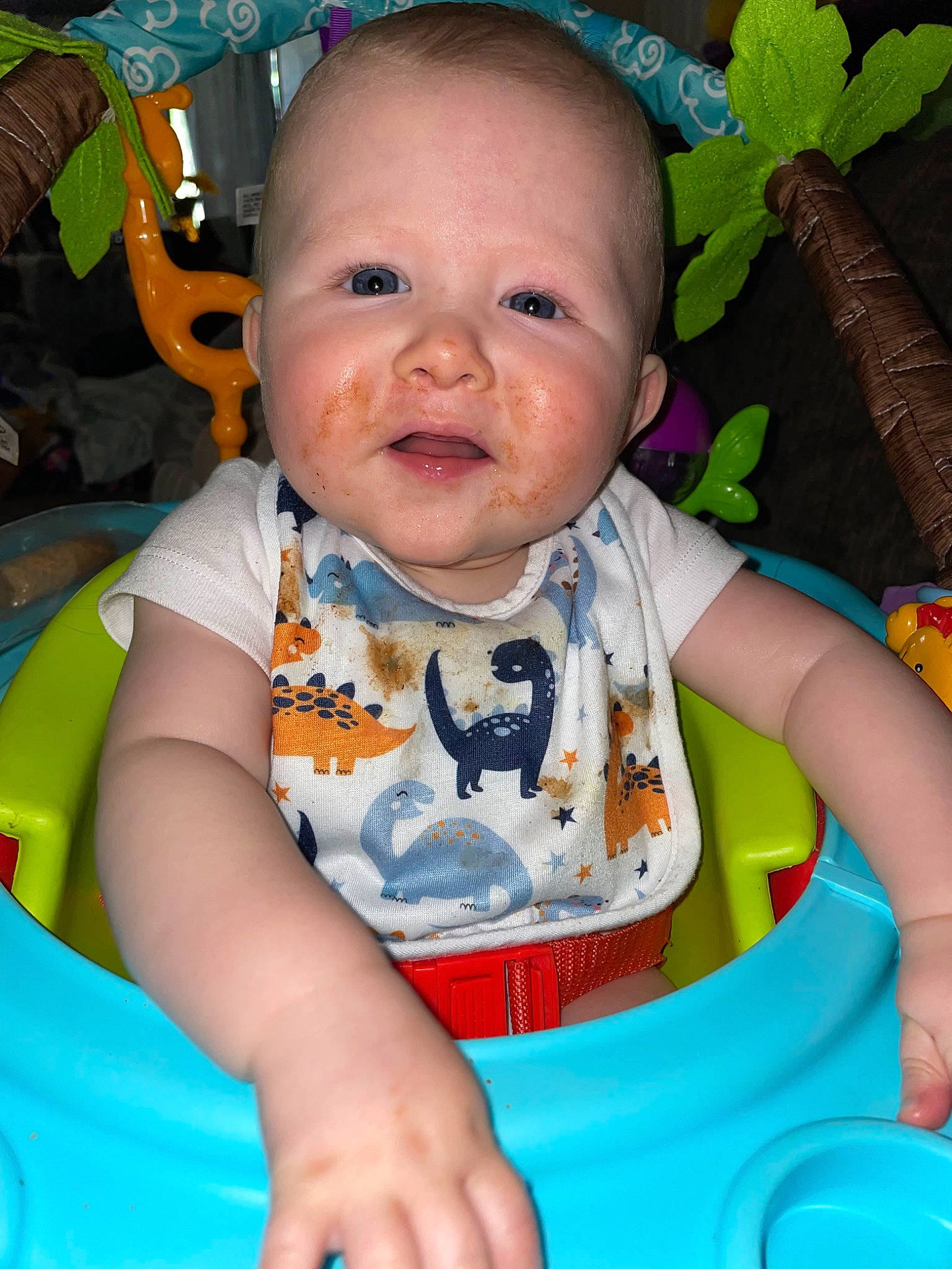 Easton joined the competition — help win amazing prizes! baby, baby_toddler_clothing, bib, blue, cheek, child, eye, fun, green, happy, head, iris, leisure, person, photograph, product, sitting, skin, smile, toddler