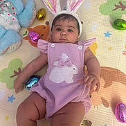 Sarah Milena joined the competition — help win amazing prizes! baby, bunny_ears, romper, plush_toy, play_mat, easter_eggs, pink, lavender, child, infant, cute, indoors, toy, colorful, face, person, holiday, festive, soft_toy, lying_down