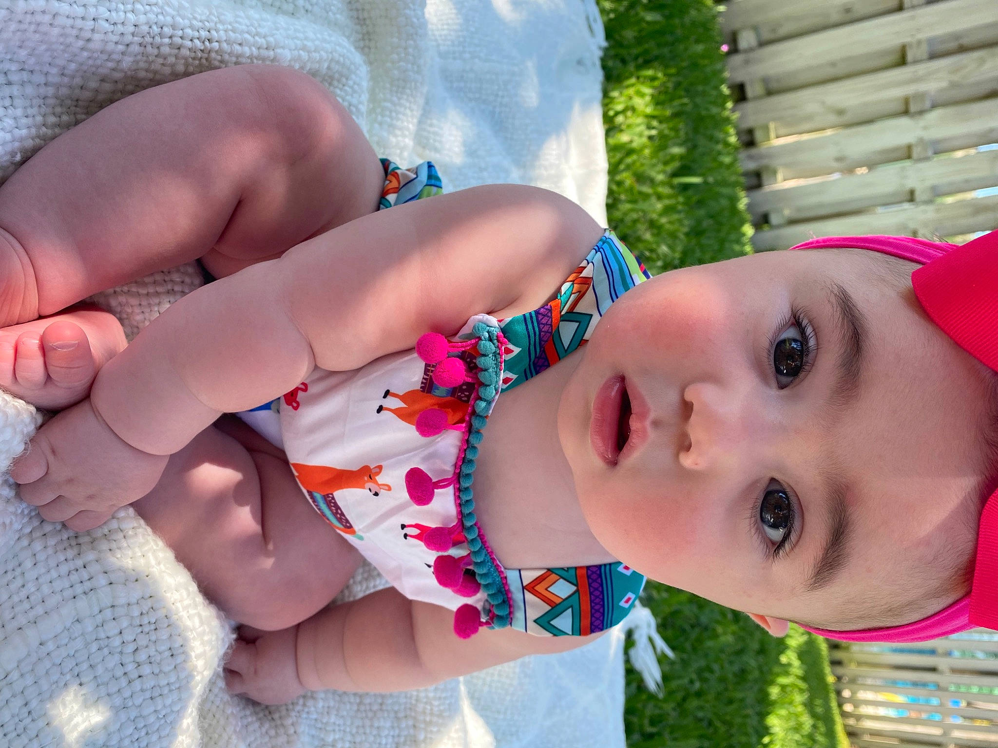 Liv joined the competition — help win amazing prizes! child, dress, eye, eyelash, face, facial_expression, grass, happy, human_body, leisure, lip, mouth, nose, person, pink, plant, skin, smile, summer, toddler