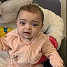 Khloe is registered to the contest to win money with this photo: baby, casual_wear, child, cozy, cute, date_display, face, furniture, indoor, infant, lock_screen, looking_at_camera, peach_clothing, phone_screen, plush_toy, portrait, sitting, soft_toy, stuffed_animal, time_display