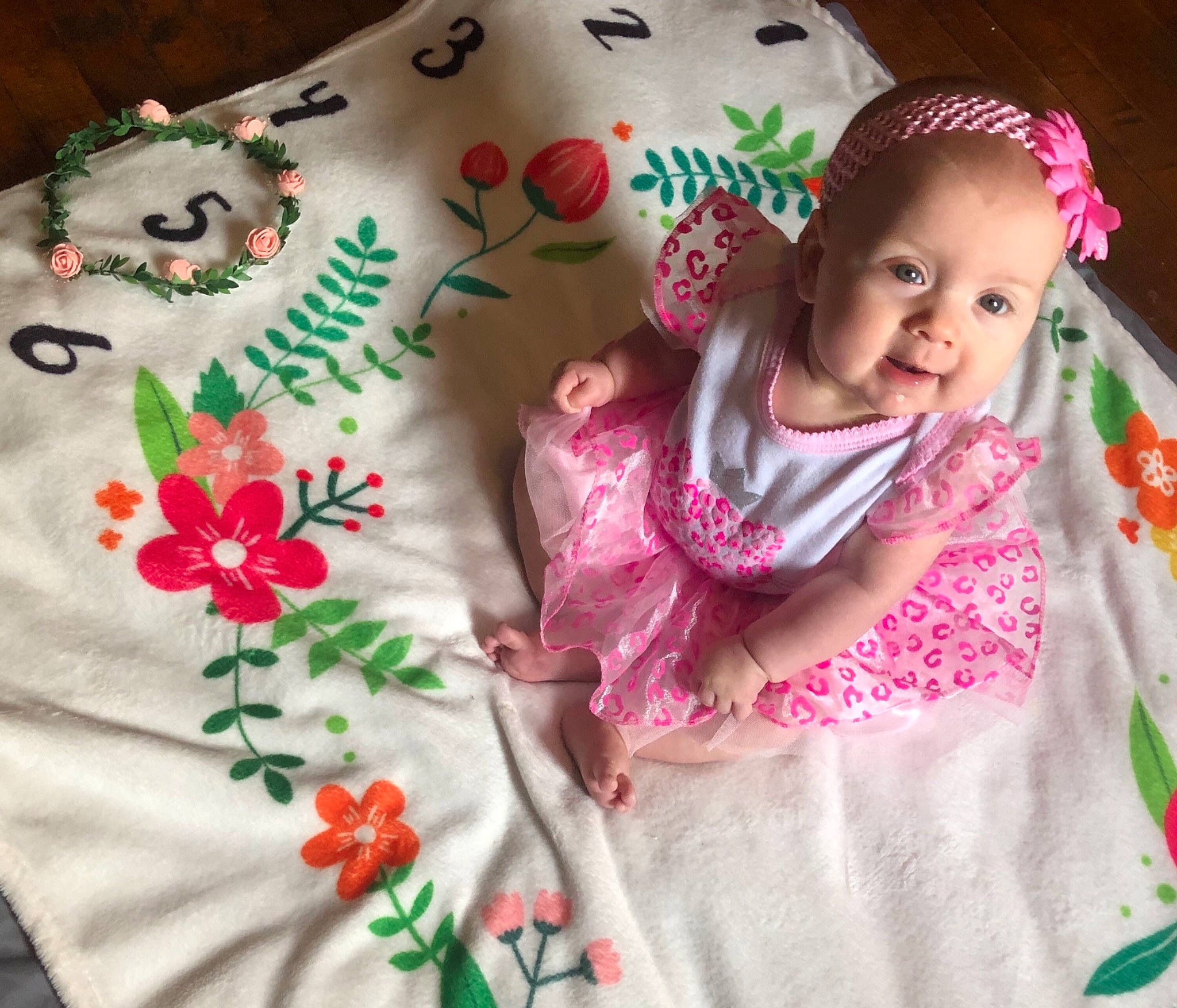 Rhiannon joined the competition — help win amazing prizes! baby, cheek, child, dress, linens, outerwear, pattern, person, pink, plant, product, sleeve, textile, toddler