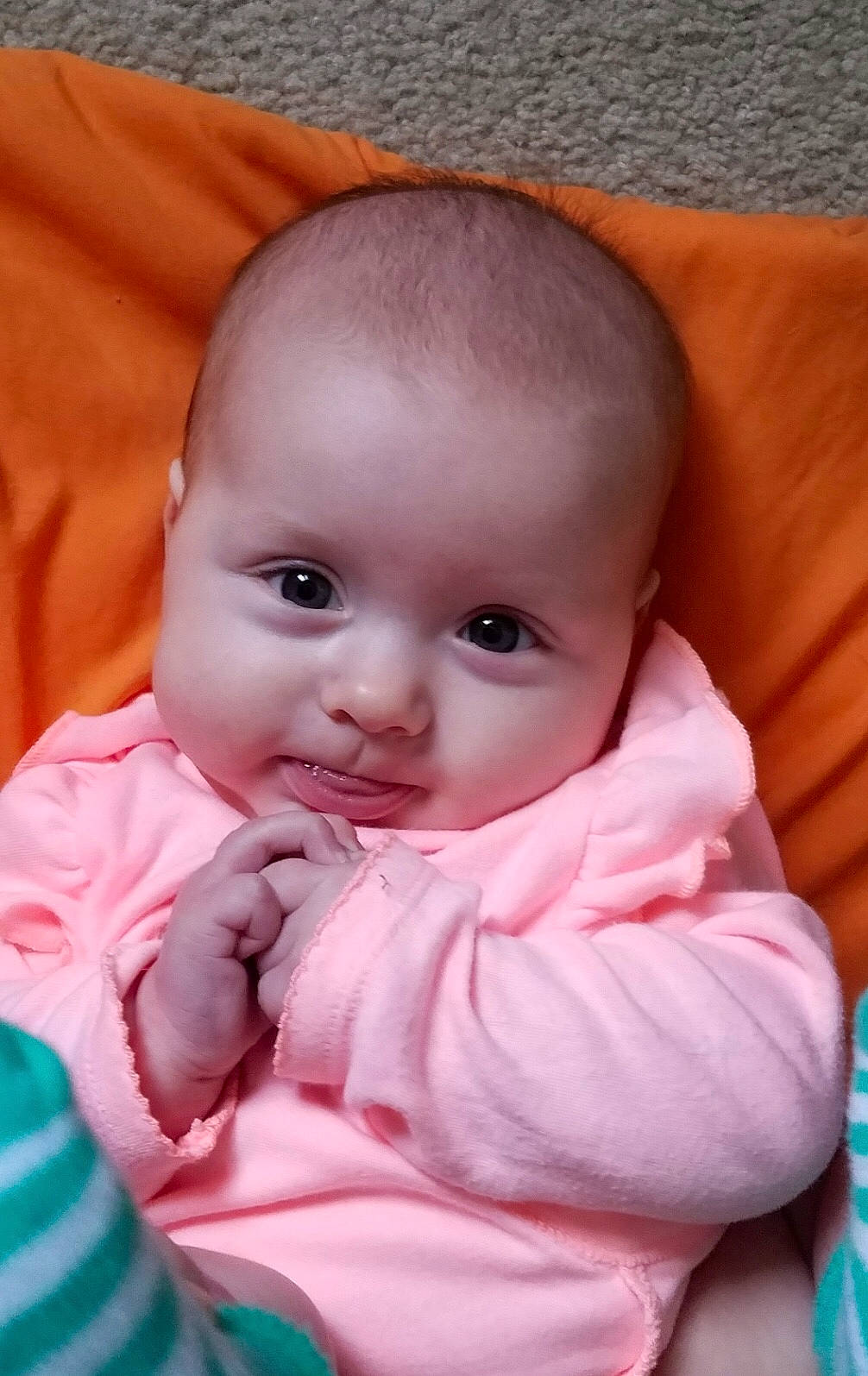 Rhiannon is registered to the contest to win money with this photo: baby, cheek, child, eye, face, head, iris, lip, mouth, nose, person, pink, skin, toddler