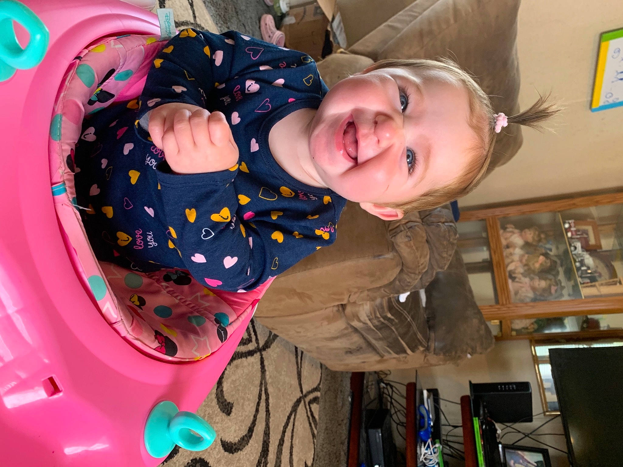 Jemma is registered to the contest to win money with this photo: baby, baby_products, baby_toddler_clothing, baby_toys, child, ear, eye, iris, magenta, mouth, nose, organ, person, picture_frame, pink, play, playground, throat, toddler, tongue