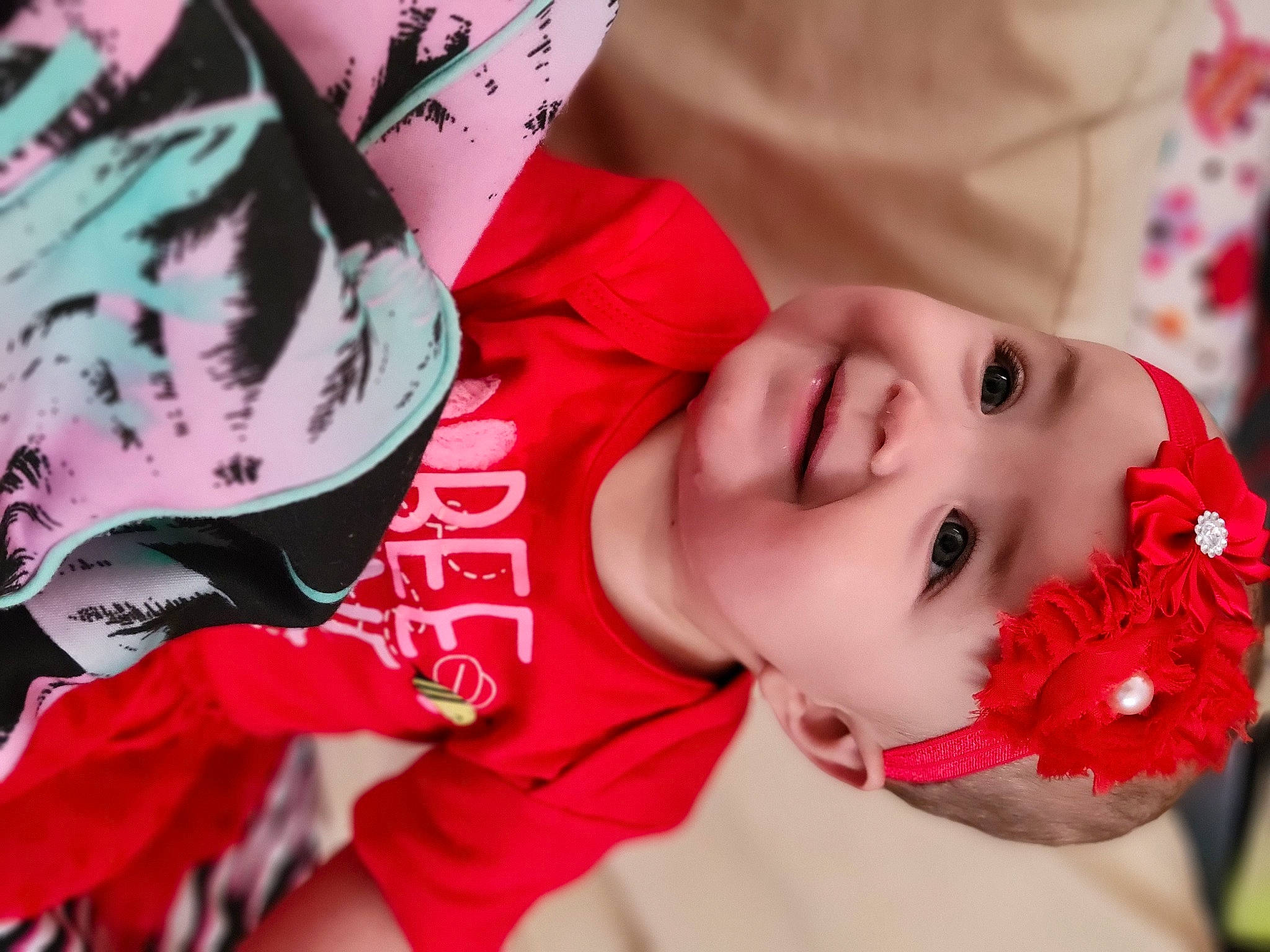 Jupiter joined the competition — help win amazing prizes! black_hair, cheek, eyelash, face, facial_expression, fashion, hairstyle, happy, head, headgear, headwear, joy, lip, nose, person, pink, plant, red, skin, sports_gear